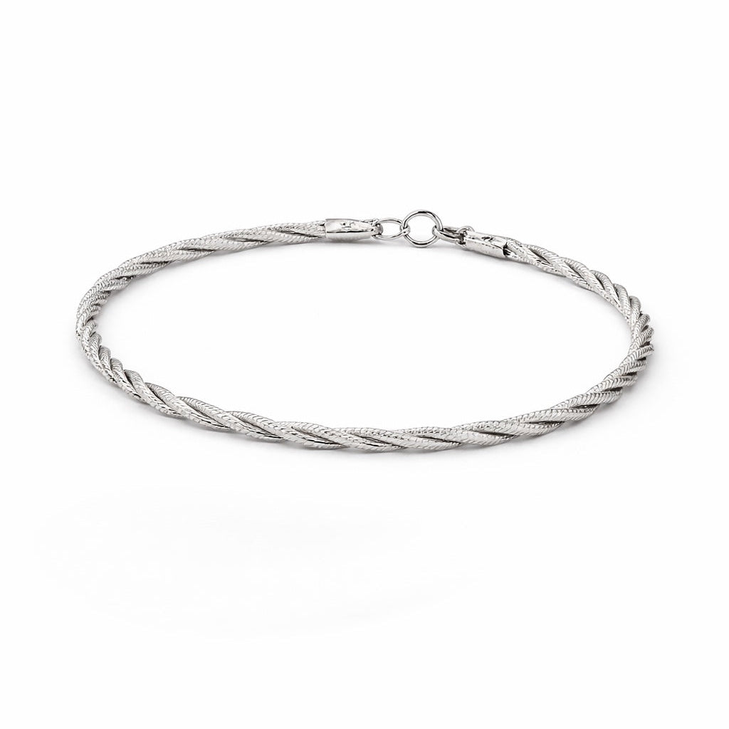 Silver braided bracelet on a white background
