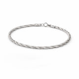 Silver braided bracelet on a white background